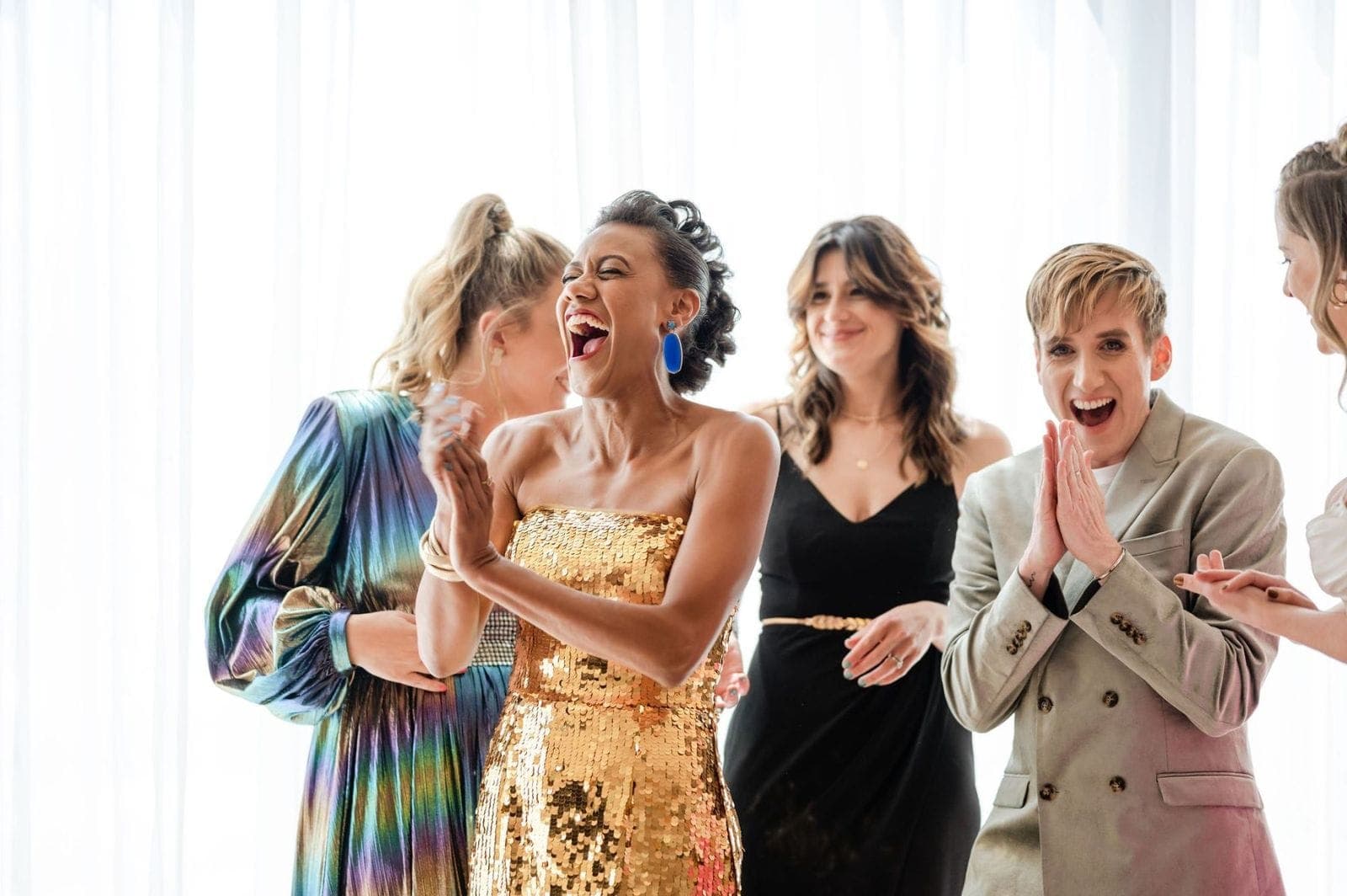 Guests mid-laugh at a Scheme Events celebration at AREA15