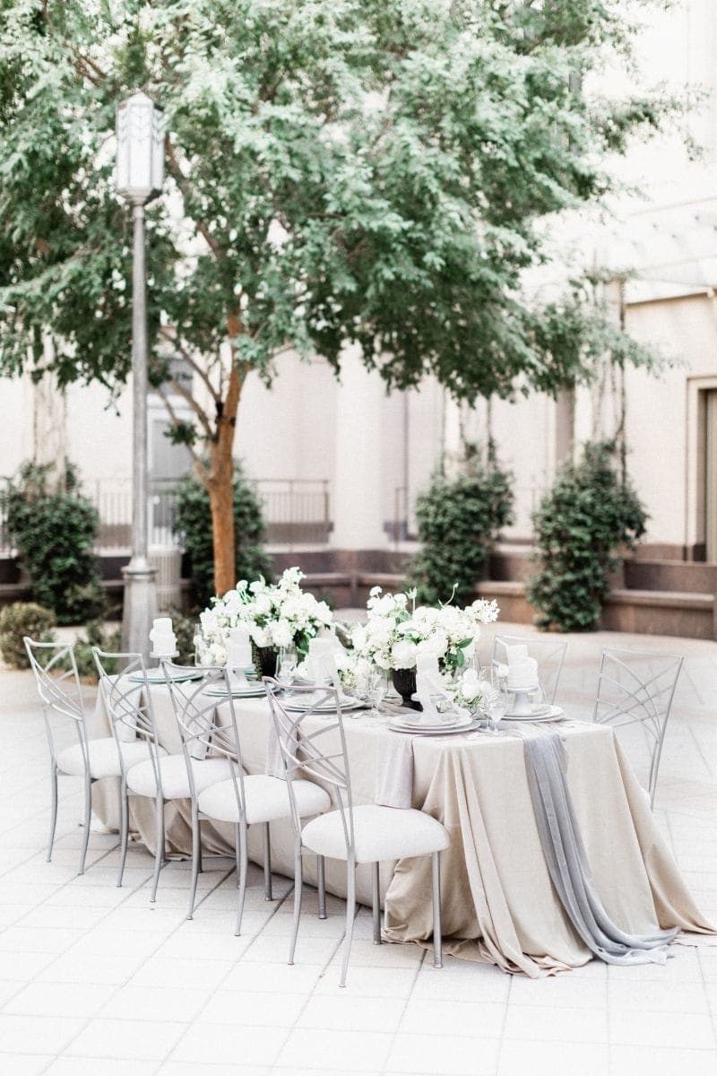 Guests raising glasses at a Scheme wedding reception at The Smith Center