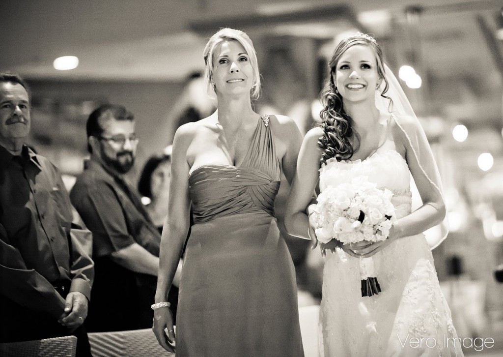 Mom walking Daughter down the aisle